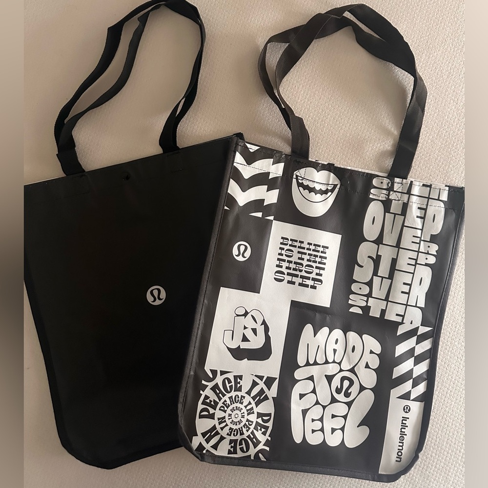 2 large Lululemon tote shopping bags.